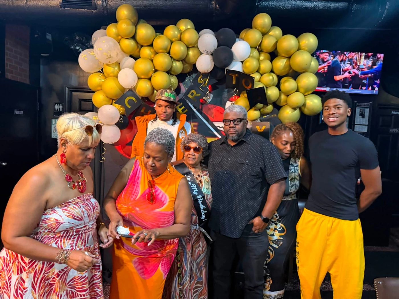 A group of our customers celebrating a birthday at The Crab Traphouse